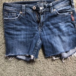 Woman’s size 30 cut offs silver